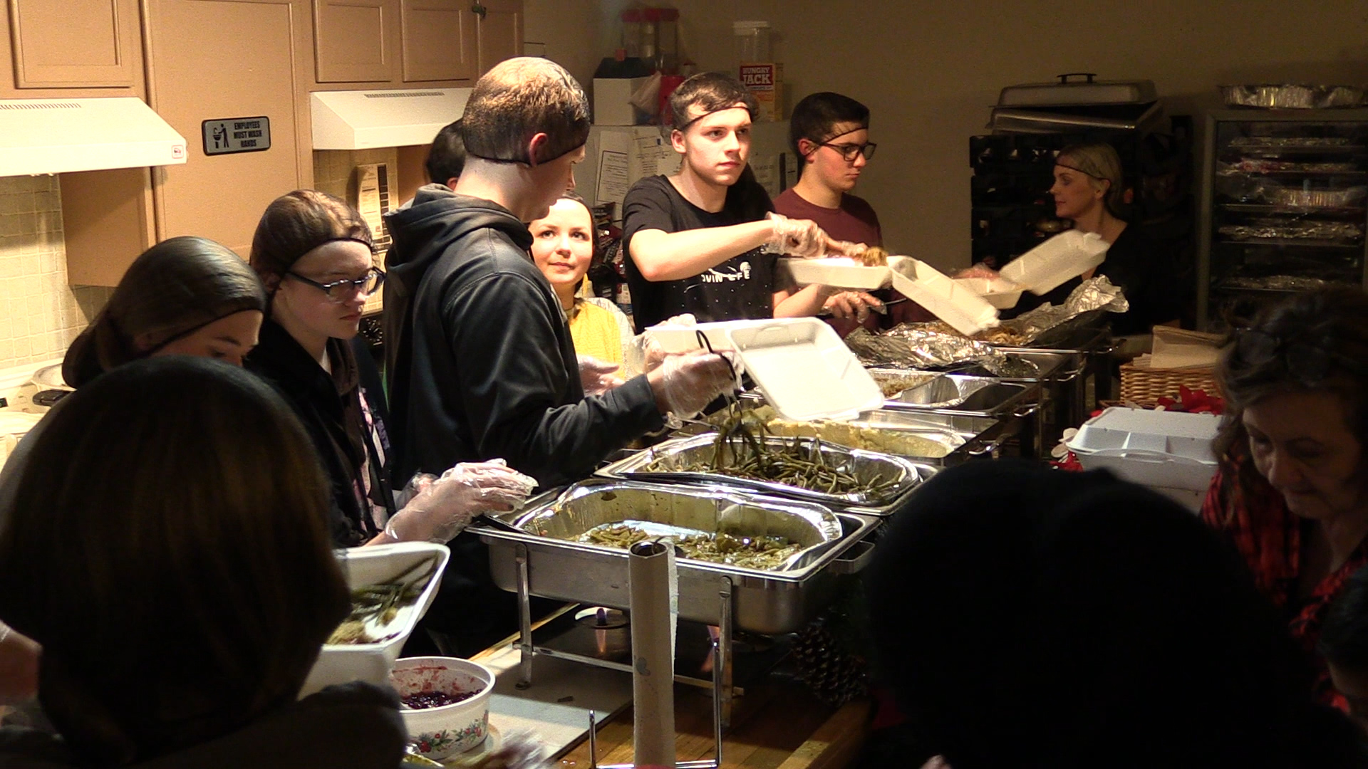 PMC physicians provide meals for those in need