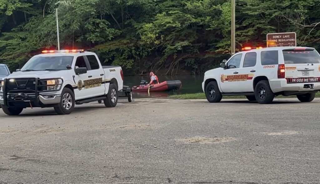 Prestonsburg Fire Department loaded boats into the water as they began the search for the missing swimmer.