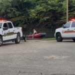 Prestonsburg Fire Department loaded boats into the water as they began the search for the missing swimmer.