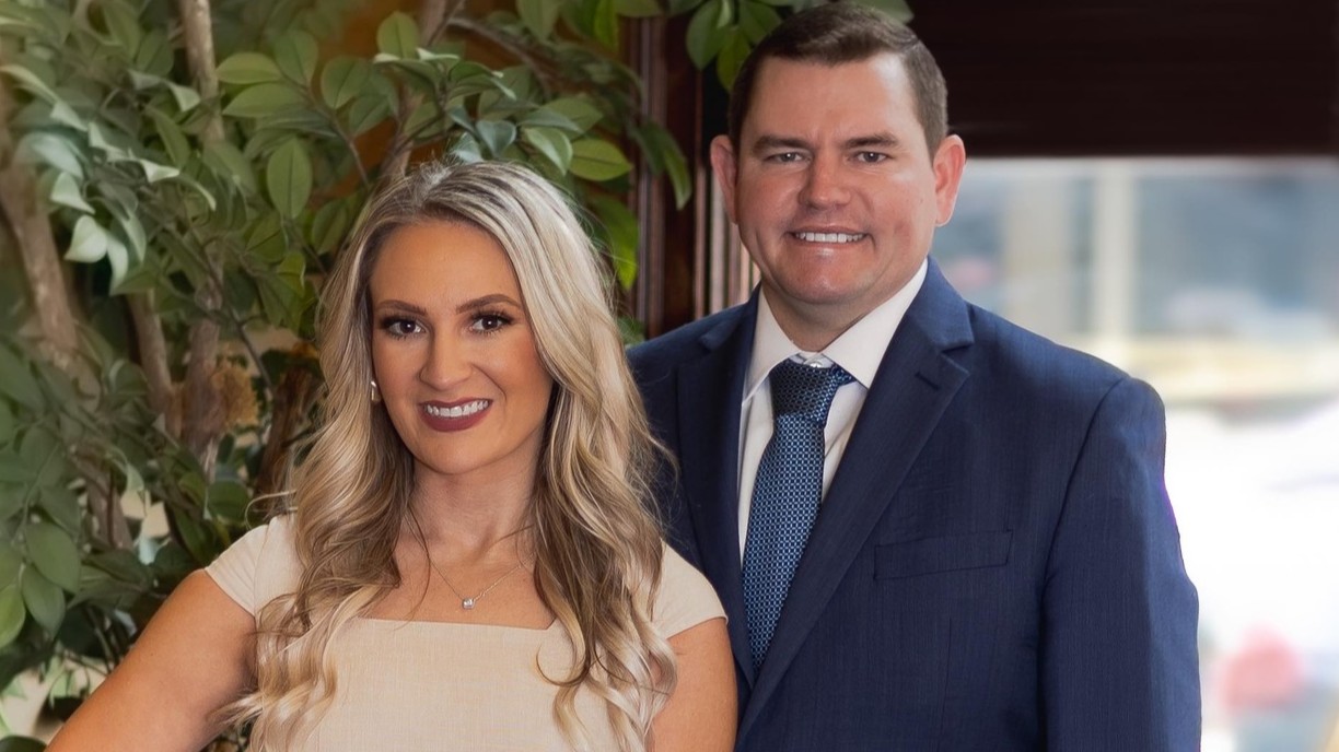 Husband-and-wife attorneys Randall and Whitney O'Neal each represent different defendants in the Amber Spradlin murder case, but those defendants are in opposition on the question of whether or not the case is delayed. The judge says that poses a conflict of interest.