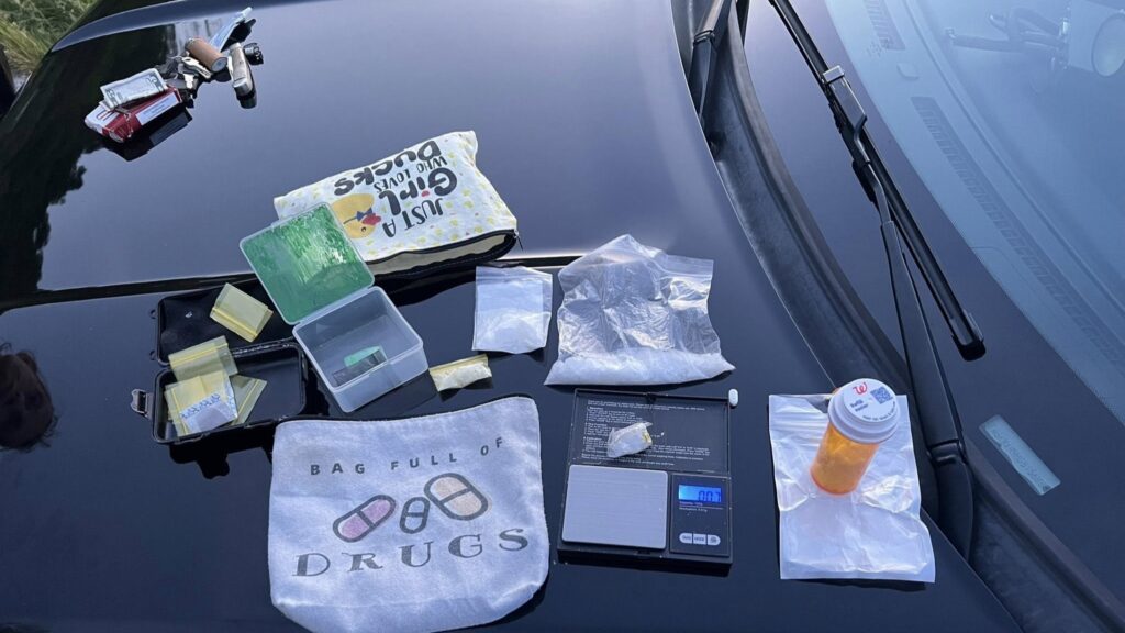 Items collected during a search of the area and suspects.