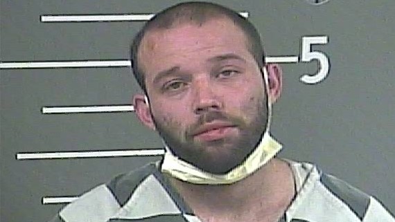 Man arrested after chase ends in crash