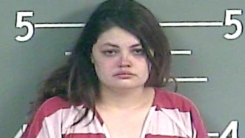 Woman charged with abusing child at hospital