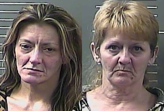 Women arrested after hotel employee spots drugs in room