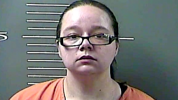 Johnson woman charged in stabbing