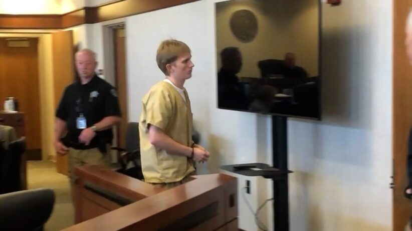 Marcus Logan Auxier leaves the courtroom following his bond reduction hearing April 23.