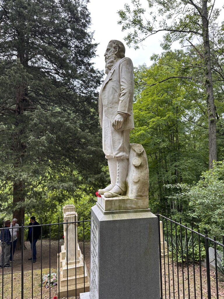 The statue of Hatfield patroarch Devil Anse Hatfield stands guard at the mountainside cemetery at Sarah Ann, West Virginia. It is on the National Register of Historic Places. (Photo by Emery Jeffreys)