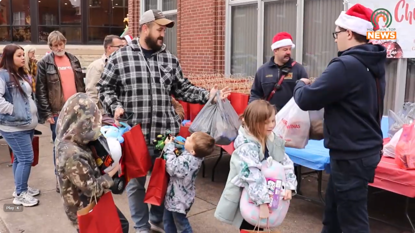 Dozens of kids receive toys and treats at Community Kitchen