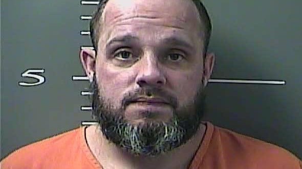 Johnson man arrested for firing gun at wall, with seven people on the other side