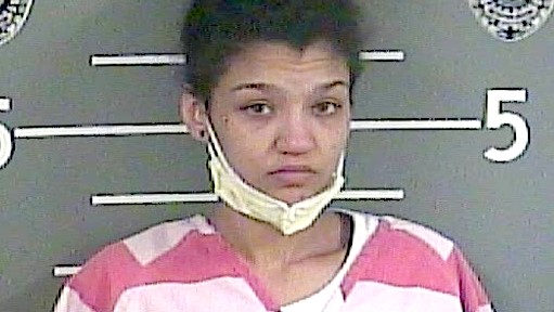 Mother arrested after child treated for overdose