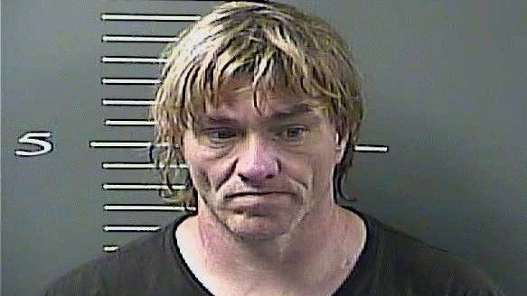 Johnson man arrested after police find phone lines cut down