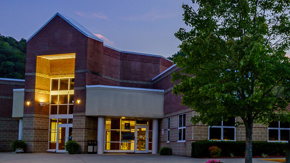 Elementary school custodian charged with drug trafficking