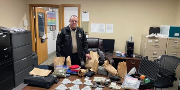 Sheriff Doug Saylor with evidence seized during last week's raid.
