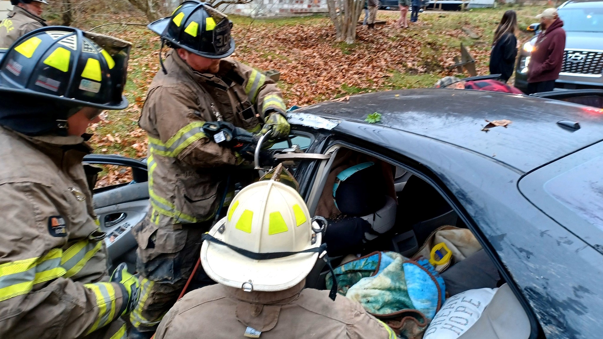 Firefighters rescue pregnant woman involved in crash
