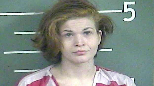 Police: Woman flees after being arrested